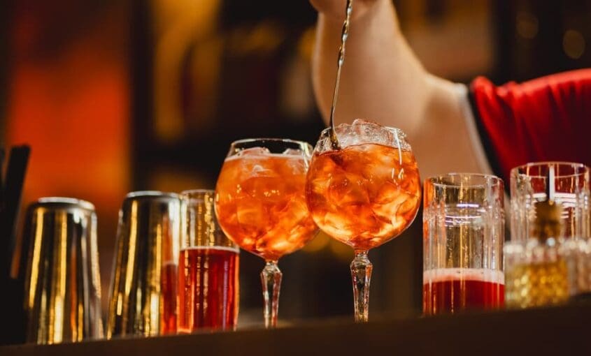 aperol-spritz-being-prepared-by-bartender